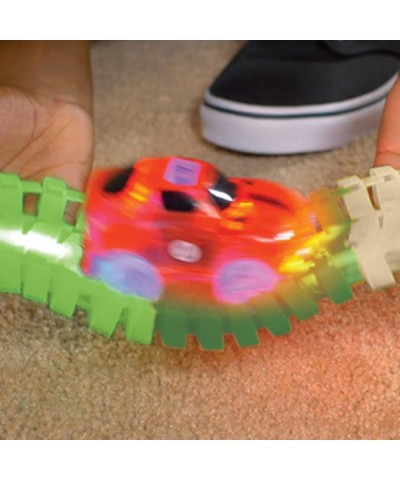 Magic Tracks Dino Chomp Glow in The Dark Racetrack Set with 9 Feet of Speedway $42.70 Toy Vehicle Playsets